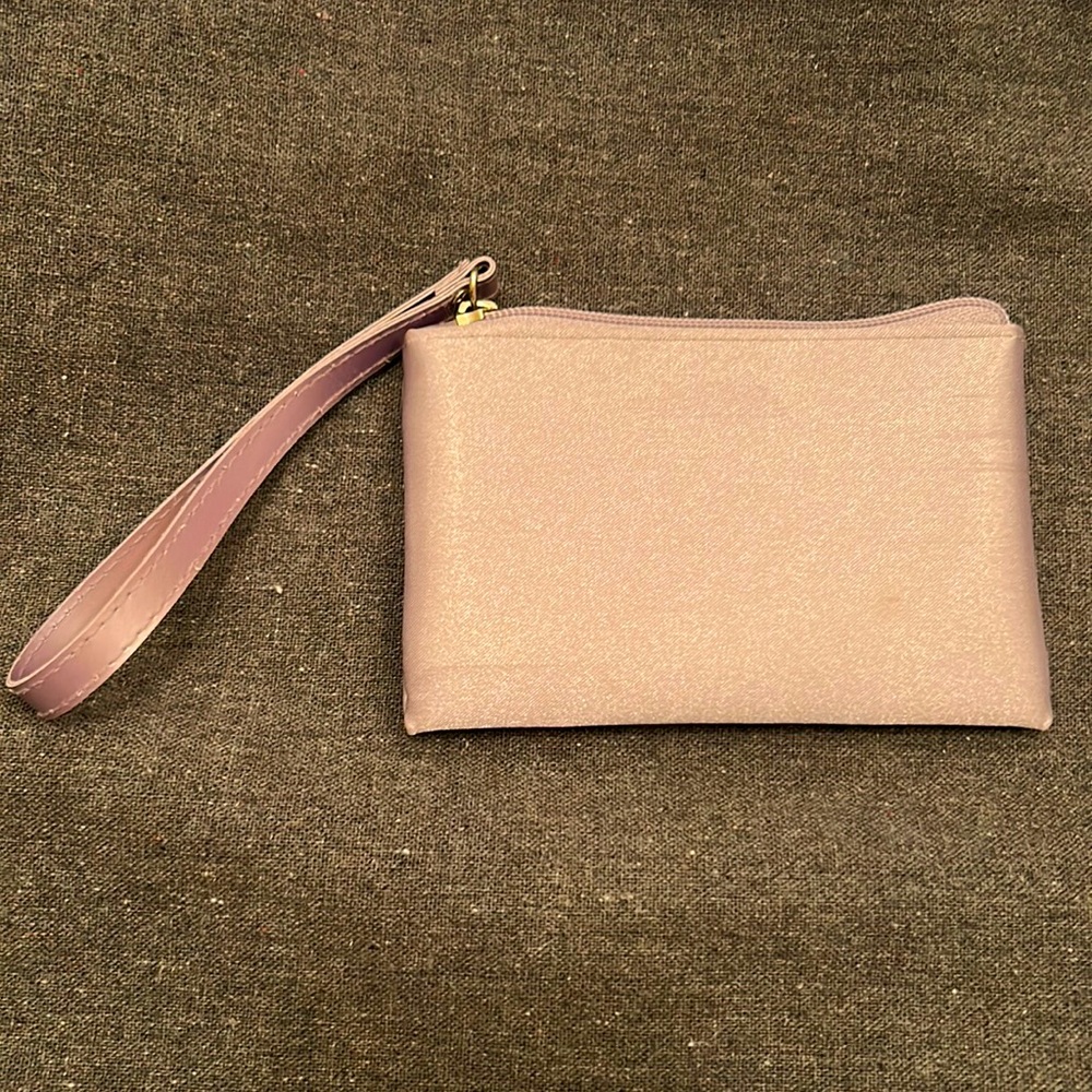 Clinique light purple small wristlet 💜